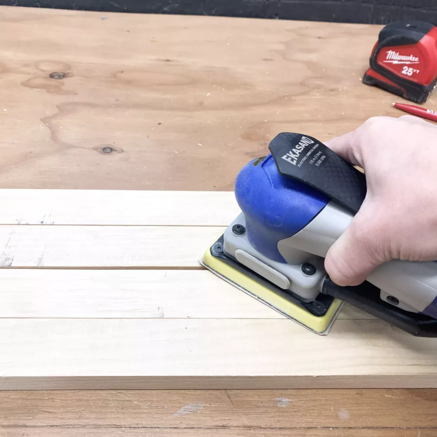 Sanding down pine boards